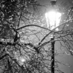 lamplight on snowy night